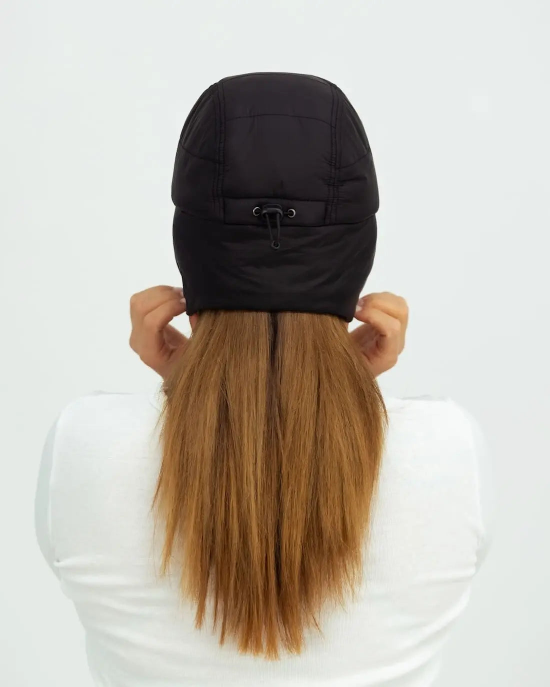 Back view of KUGY Insulated Mountain Cap in a studio setting